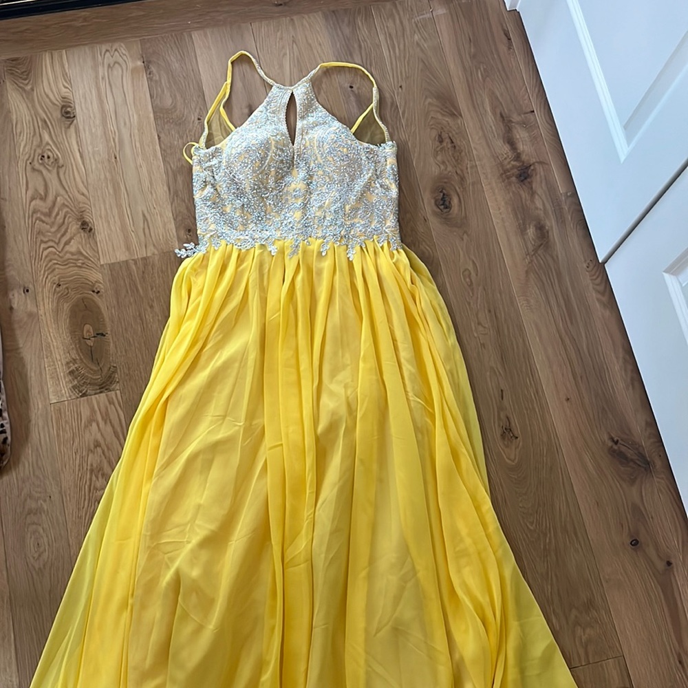 Sparkly silver and yellow women’s prom dress